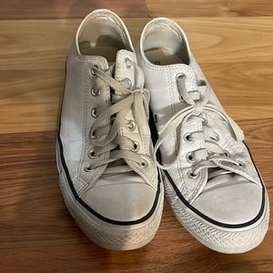 Leather white converse.